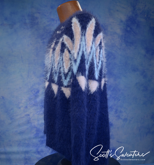 Blue fuzzy woman's eyelash sweater with white and light blue jacquard design by LC Lauren Conrad