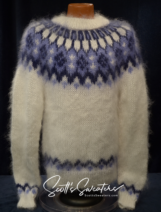 White men's hand-knit turtleneck mohair sweater with blue yoke pattern by Scott's Sweaters