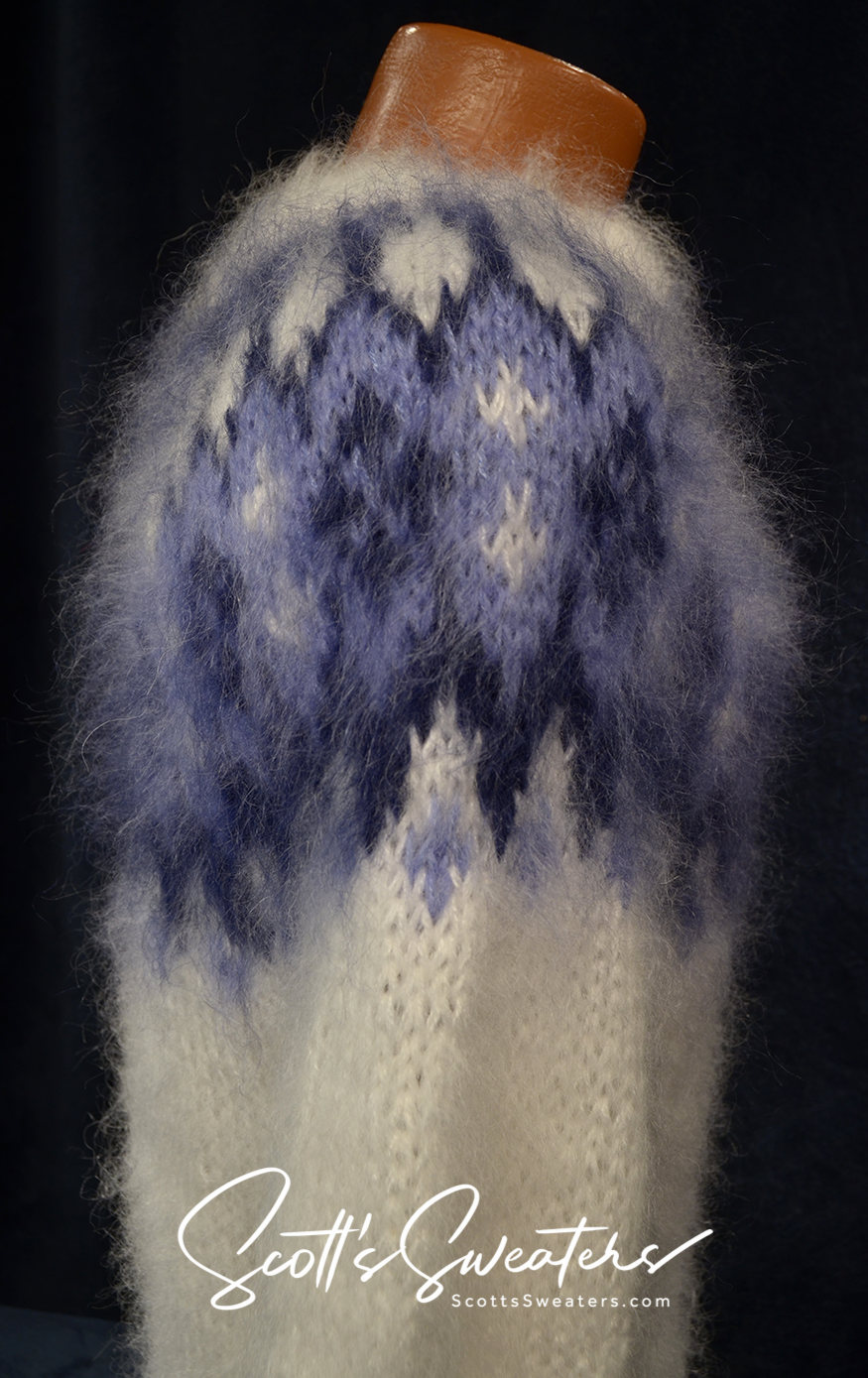 White men's hand-knit turtleneck mohair sweater with blue yoke pattern by Scott's Sweaters