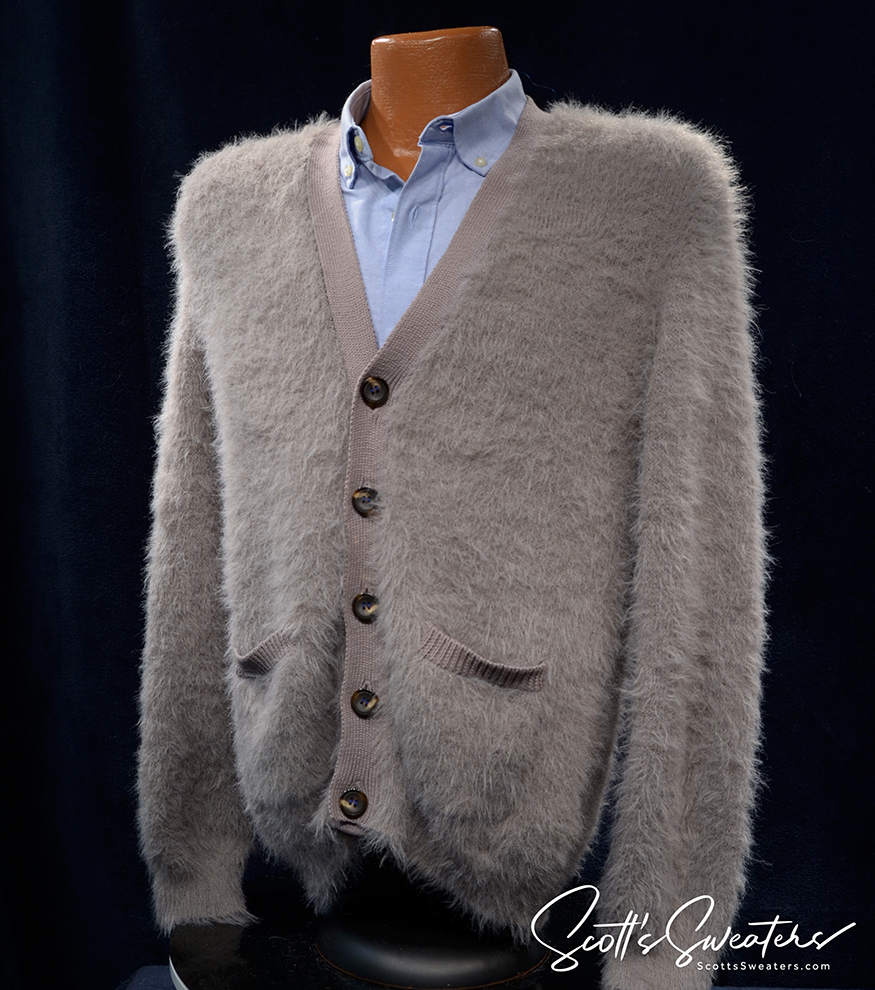 Grey men's fuzzy button-front cardigan sweater with front pockets from Urban Outfitters