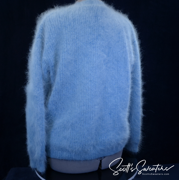 Woman's powder-blue angora cardigan with oversized metal buttons and front pockets in large/XL size