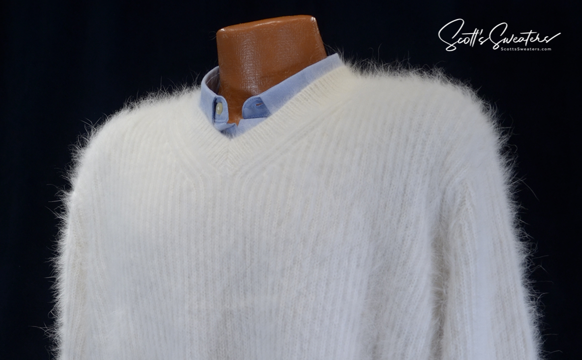 Men's soft luxurious white angora V-neck sweater with rib-knit design on mannequin