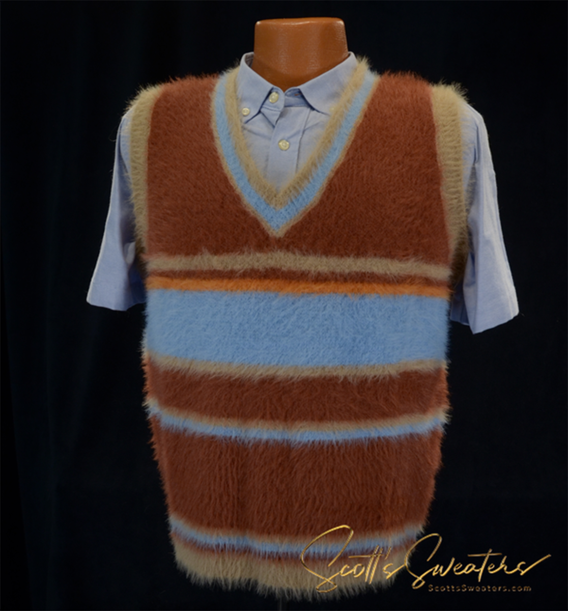 Colorfully striped soft fuzzy sleeveless brown, blue, and tan sweater vest on shirt mannequin