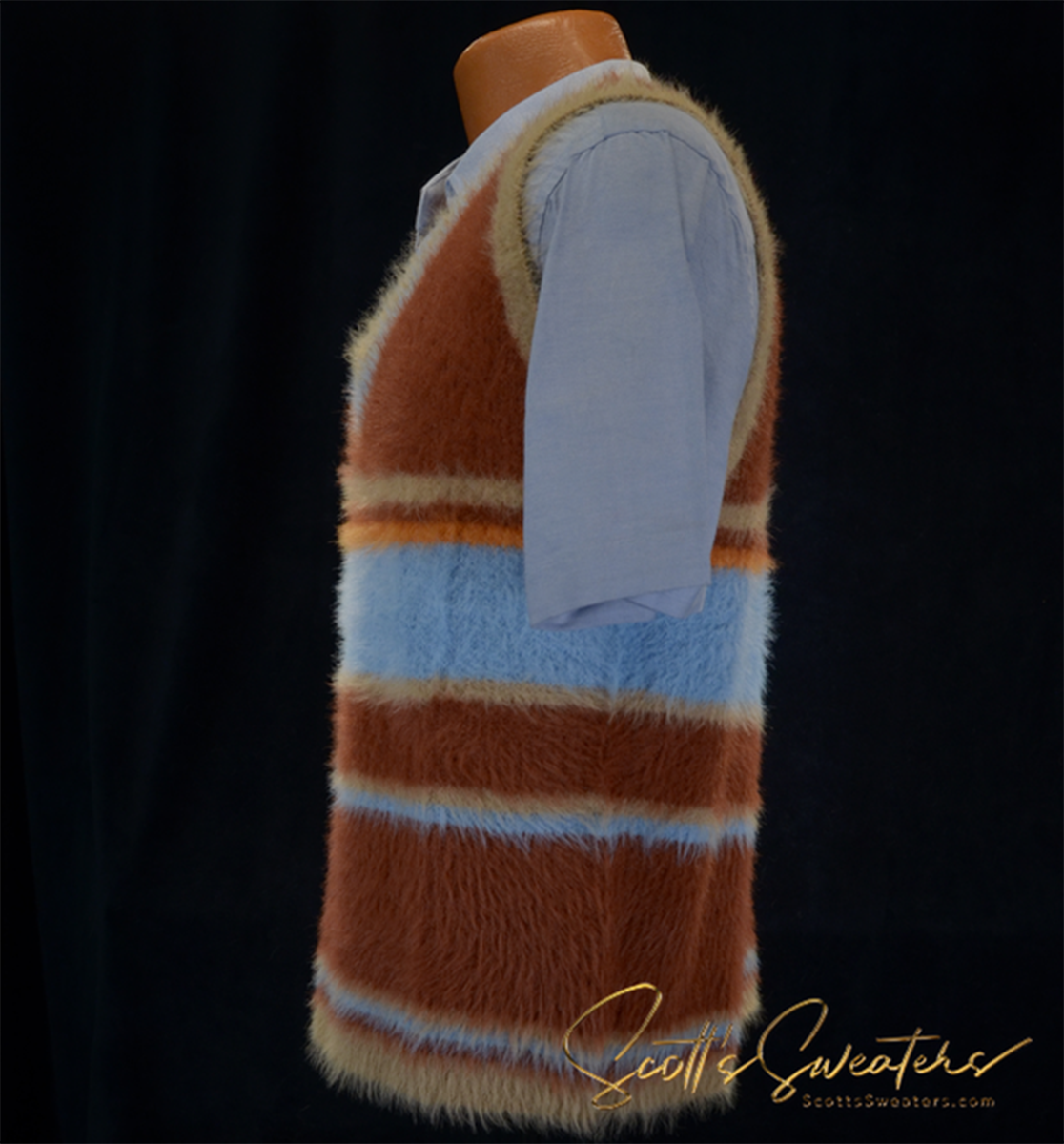 Colorfully striped brown, blue, and tan fuzzy sleeveless V-neck sweater vest on mannequin