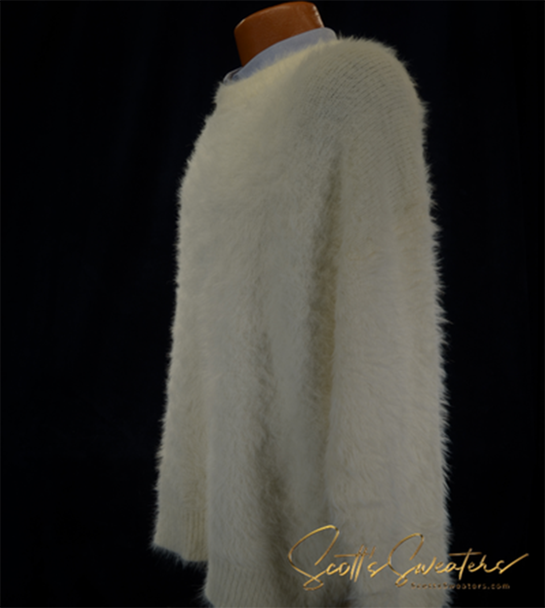 Men's fuzzy ivory crewneck eyelash sweater displayed on mannequin against black background