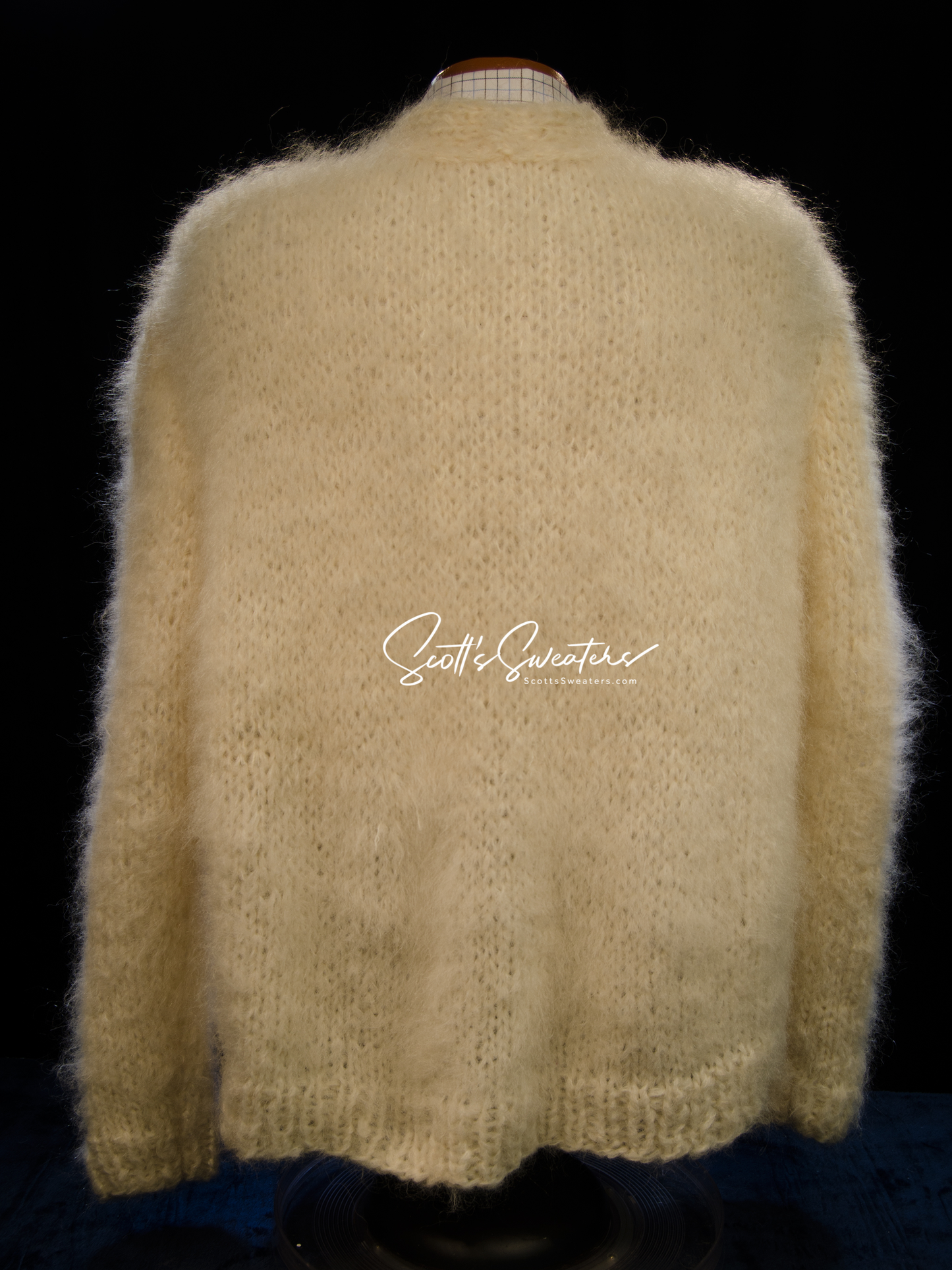 Men's hand-knit mohair and alpaca blend cardigan sweater with soft texture and cable-knit details