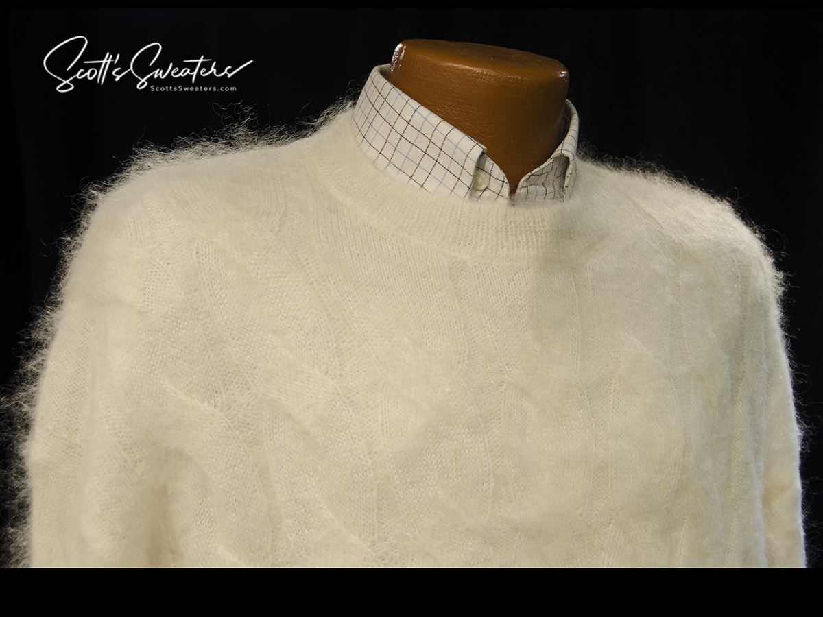 Men's white cable-knit mohair crewneck sweater by All Saints with checkered shirt underneath.