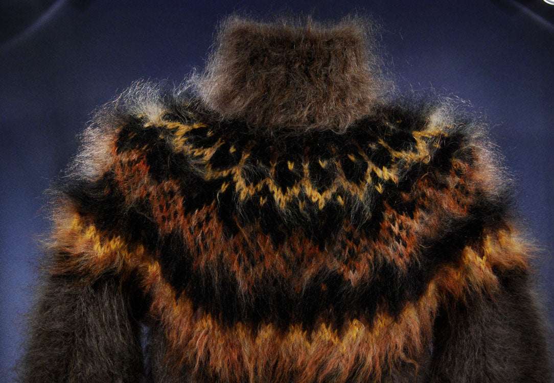 Men's handknit turtleneck mohair sweater in mink color with patterned yoke and high warm collar