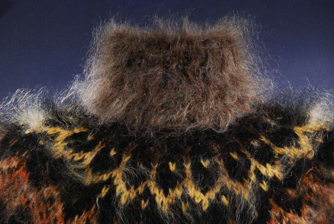 Men's handknit turtleneck mohair sweater in mink color with high fuzzy collar and patterned design