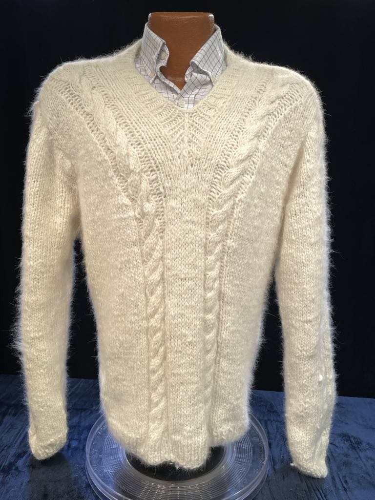Men's hand-spun angora and silk blend sweater with cable knit design in cream color.