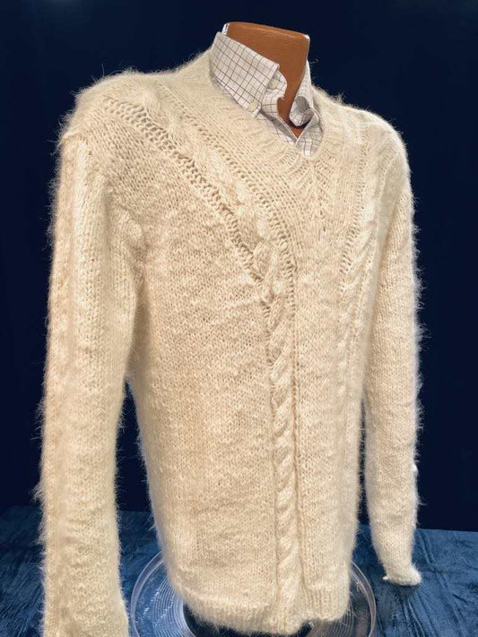 Men's home-spun angora-silk cream sweater with cable knit pattern on mannequin