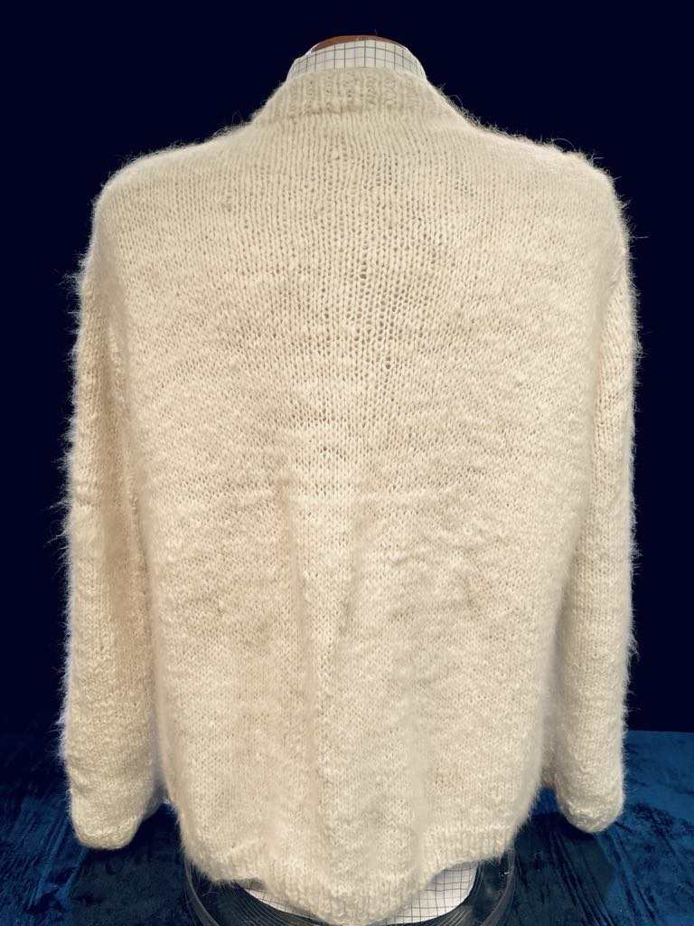 Men's home-spun angora-silk hand-knit sweater in cream color, soft and lightweight.