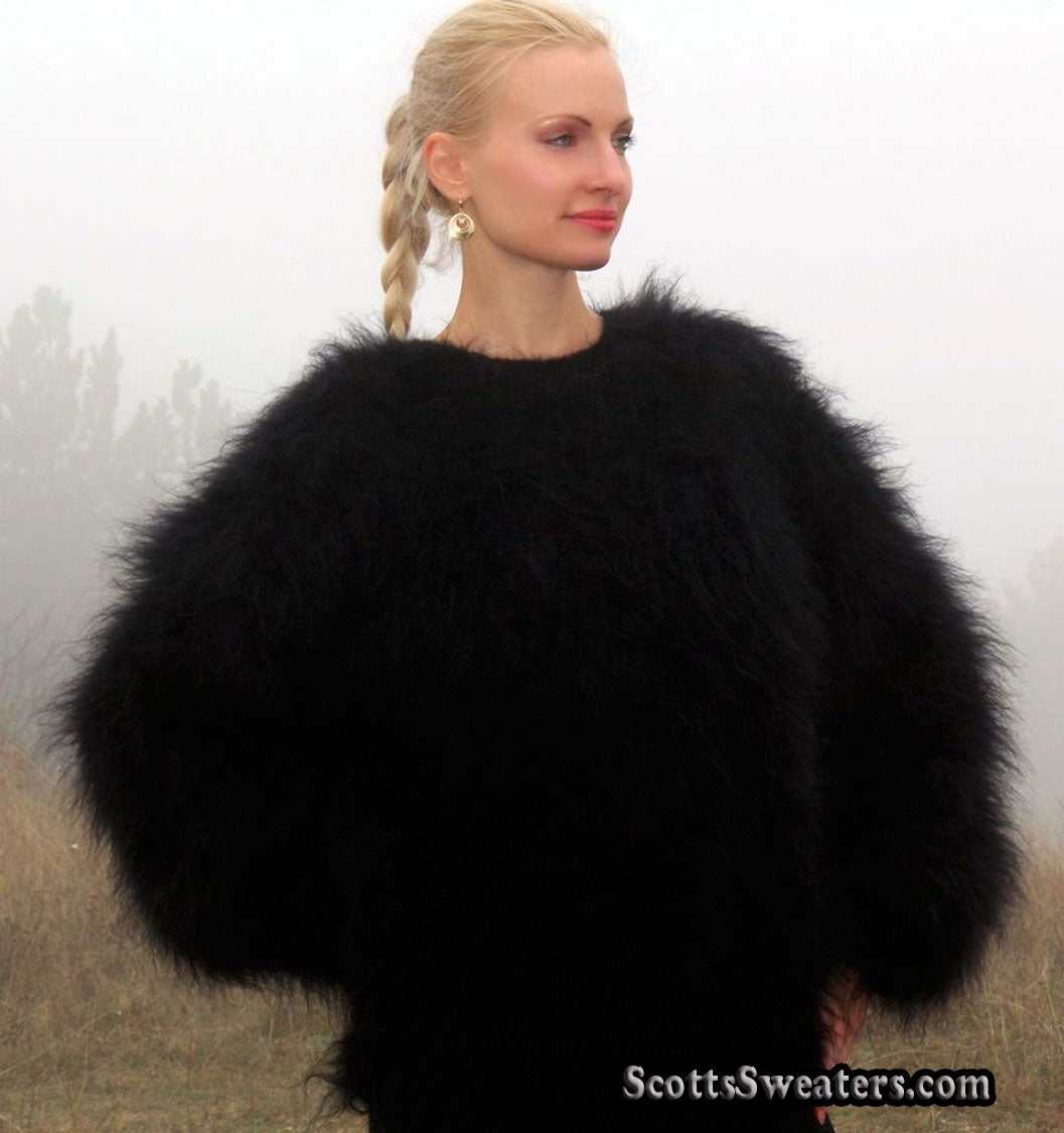 Woman wearing black very fuzzy mohair sweater by Scott's Sweaters large size