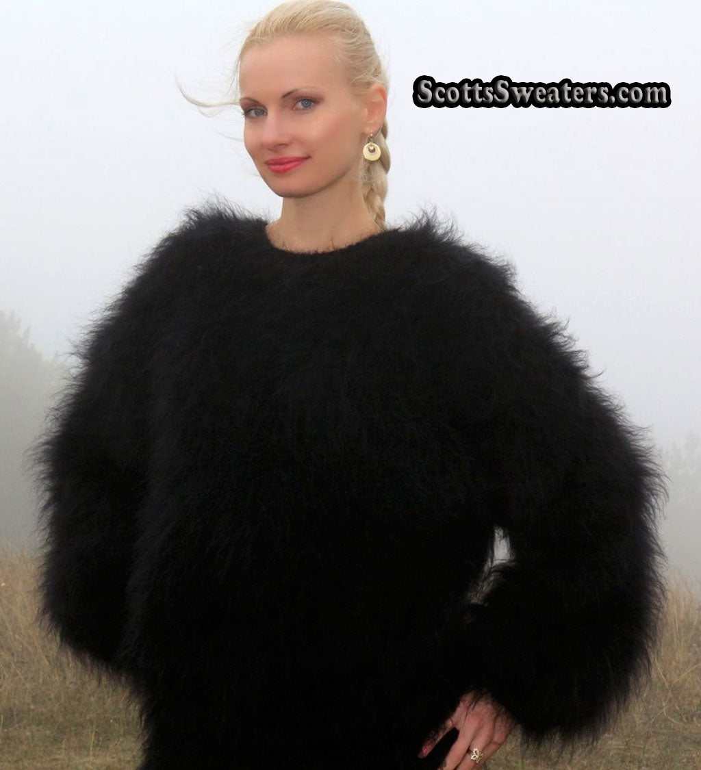Woman wearing black very fuzzy mohair sweater with round neck by Scott's Sweaters
