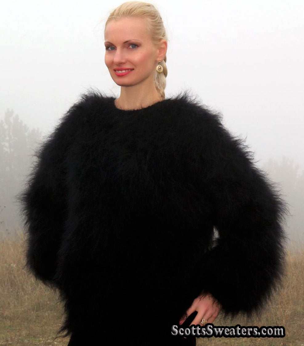 Woman wearing black very fuzzy mohair sweater with round neck by Scott's Sweaters