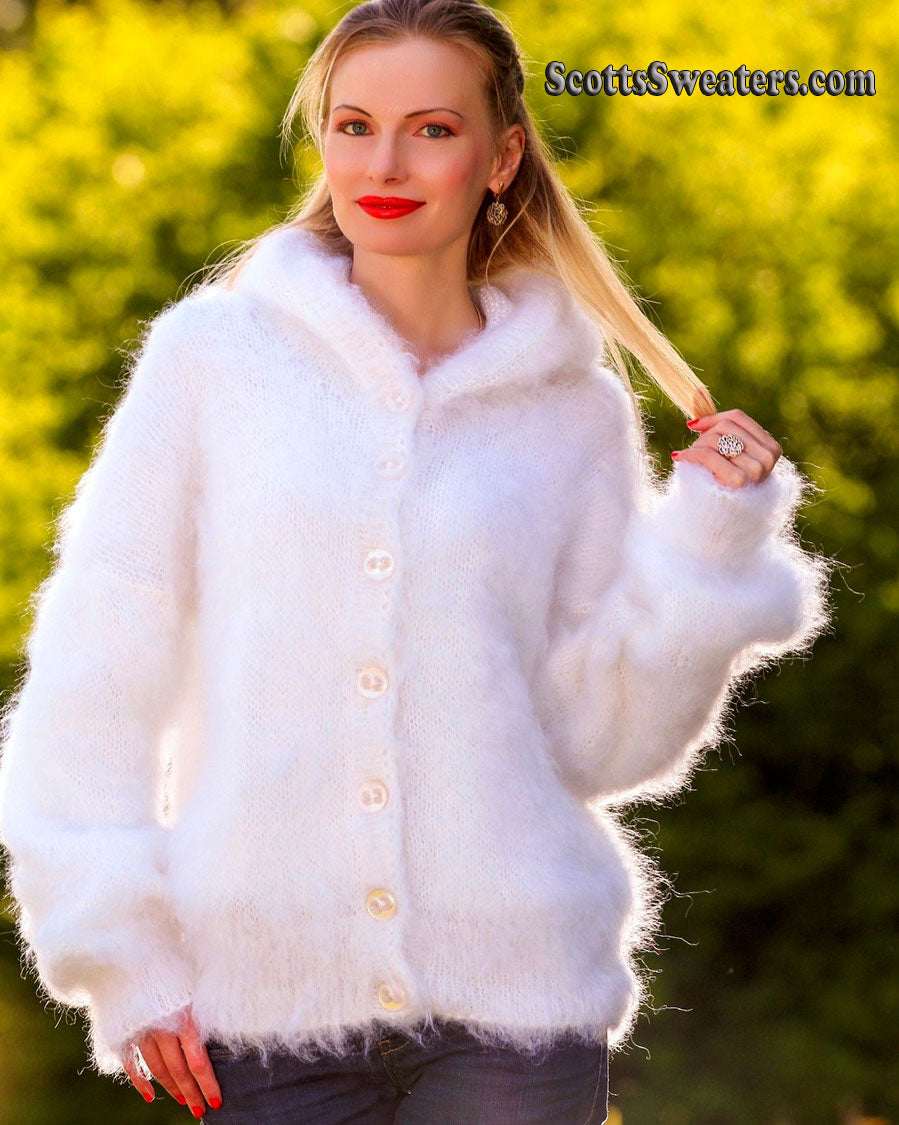 Woman's white hand-knit mohair sweater jacket with hood, large/X-large size, modeled outdoors