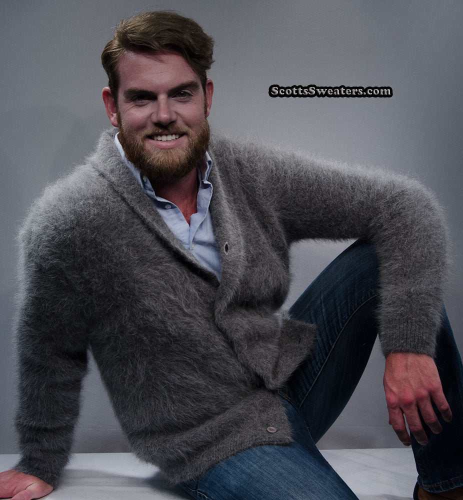 Men's solid-color angora cardigan sweater with shawl-neck collar in soft gray worn by smiling man