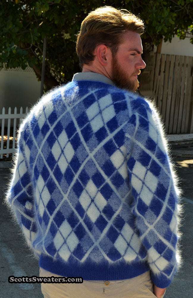 Men's argyle angora cardigan sweater in blue and white diamond pattern modeled outdoors