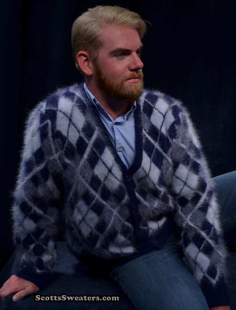 Men wearing navy and white three-tone argyle angora cardigan sweater sitting against dark background