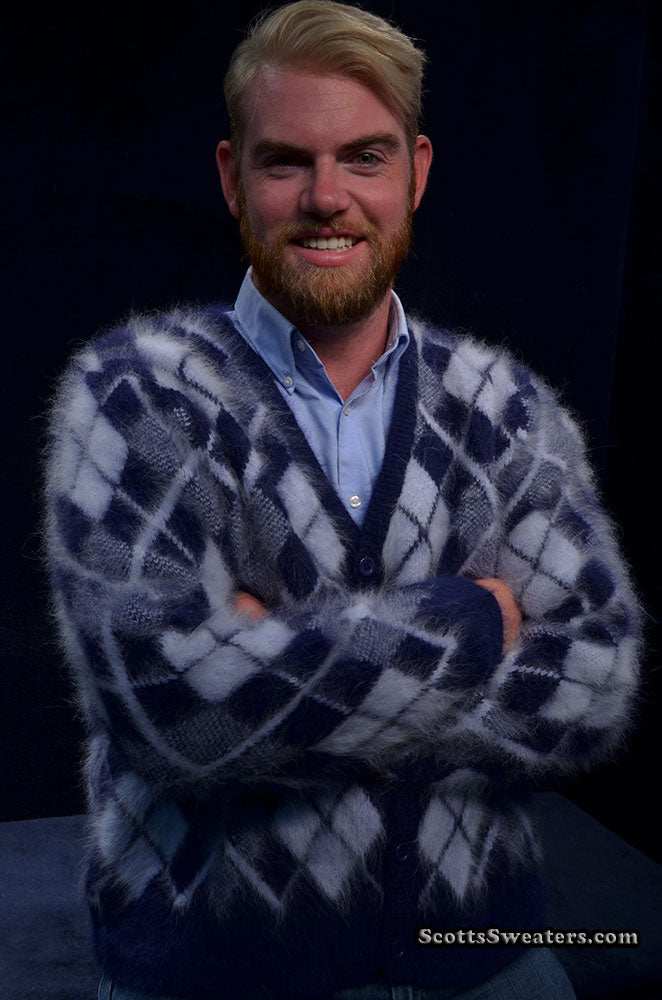 Men's argyle angora cardigan sweater with three-tone argyle pattern and ultra-soft double-thickness knit worn by smiling man