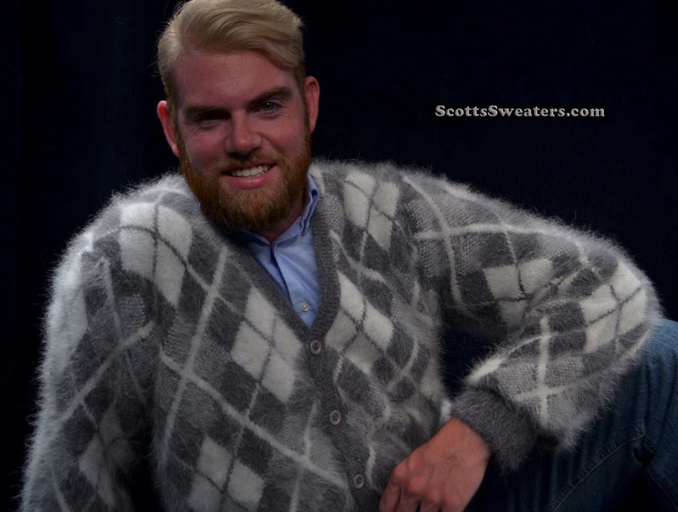 Men's argyle angora cardigan sweater in soft gray and white tones worn by smiling man
