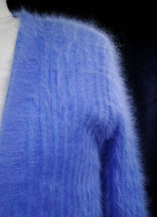 Woman's powder-blue angora cardigan sweater with pockets by Connie A. Lee