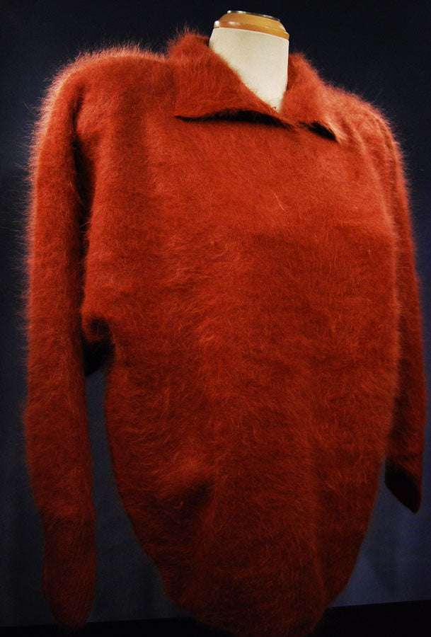Woman's angora polo-neck sweater in soft red with long sleeves and cozy texture