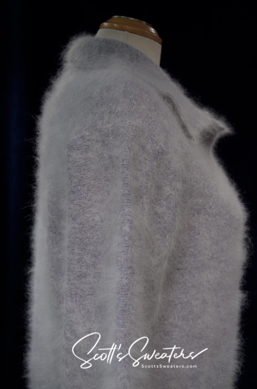 Grey woman's angora polo-neck sweater made of soft 80% angora, small/medium size, displayed on mannequin.