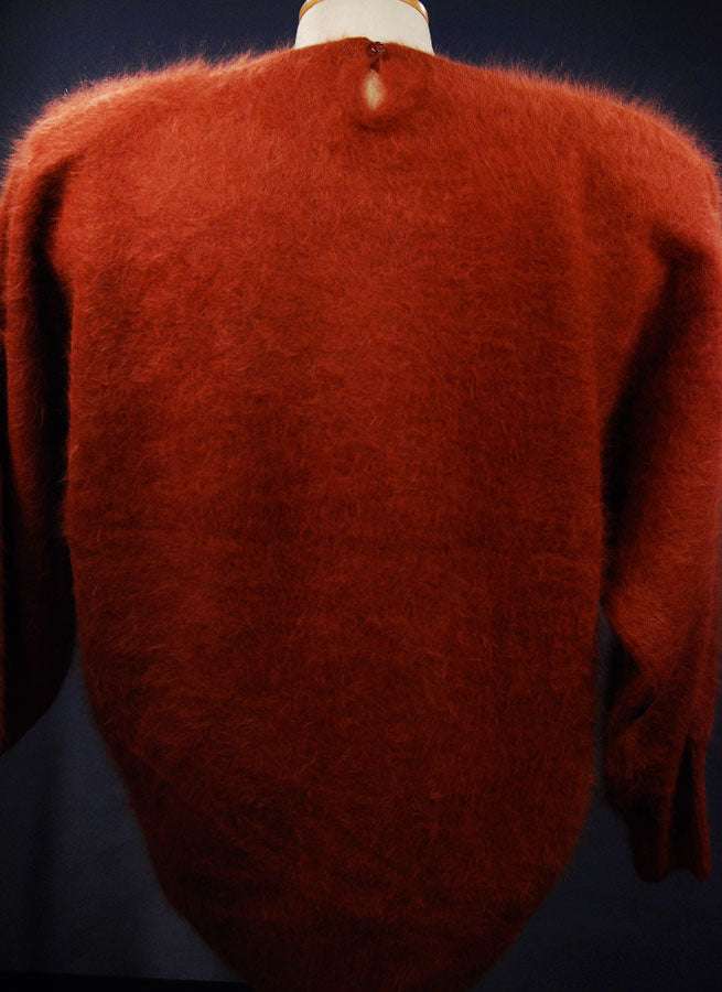Brick-red woman's angora jewel-neck sweater by Connie A Lee in small/medium size
