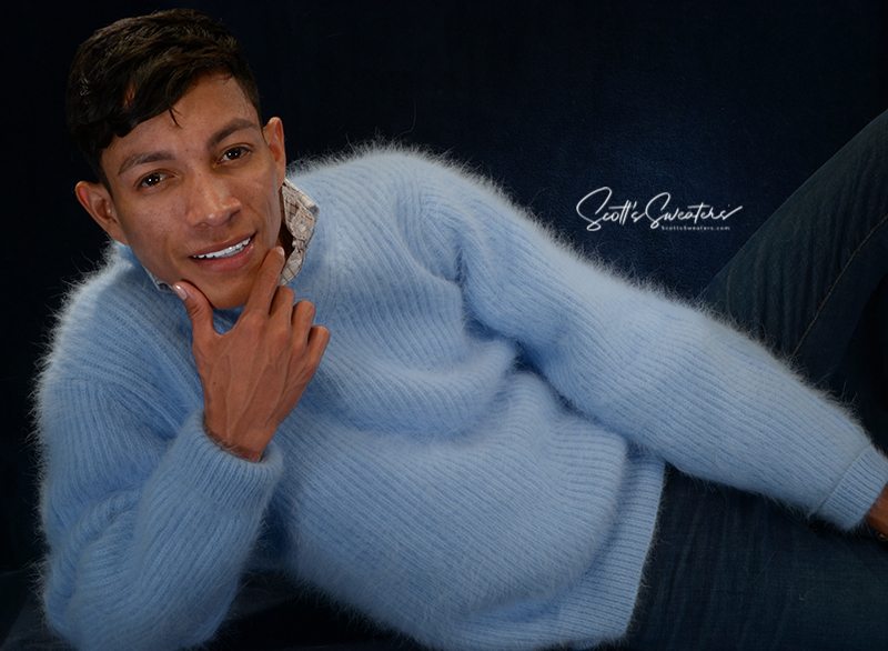 Men's soft luxurious light blue angora sweater with rib-knit design and close-cut V-neck worn by model