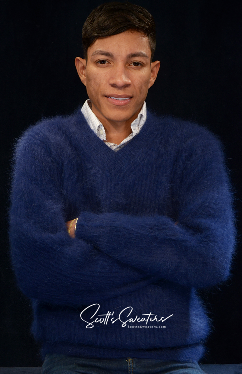 Men's soft luxurious angora sweater in navy blue with V-neck and rib-knit design worn by male model
