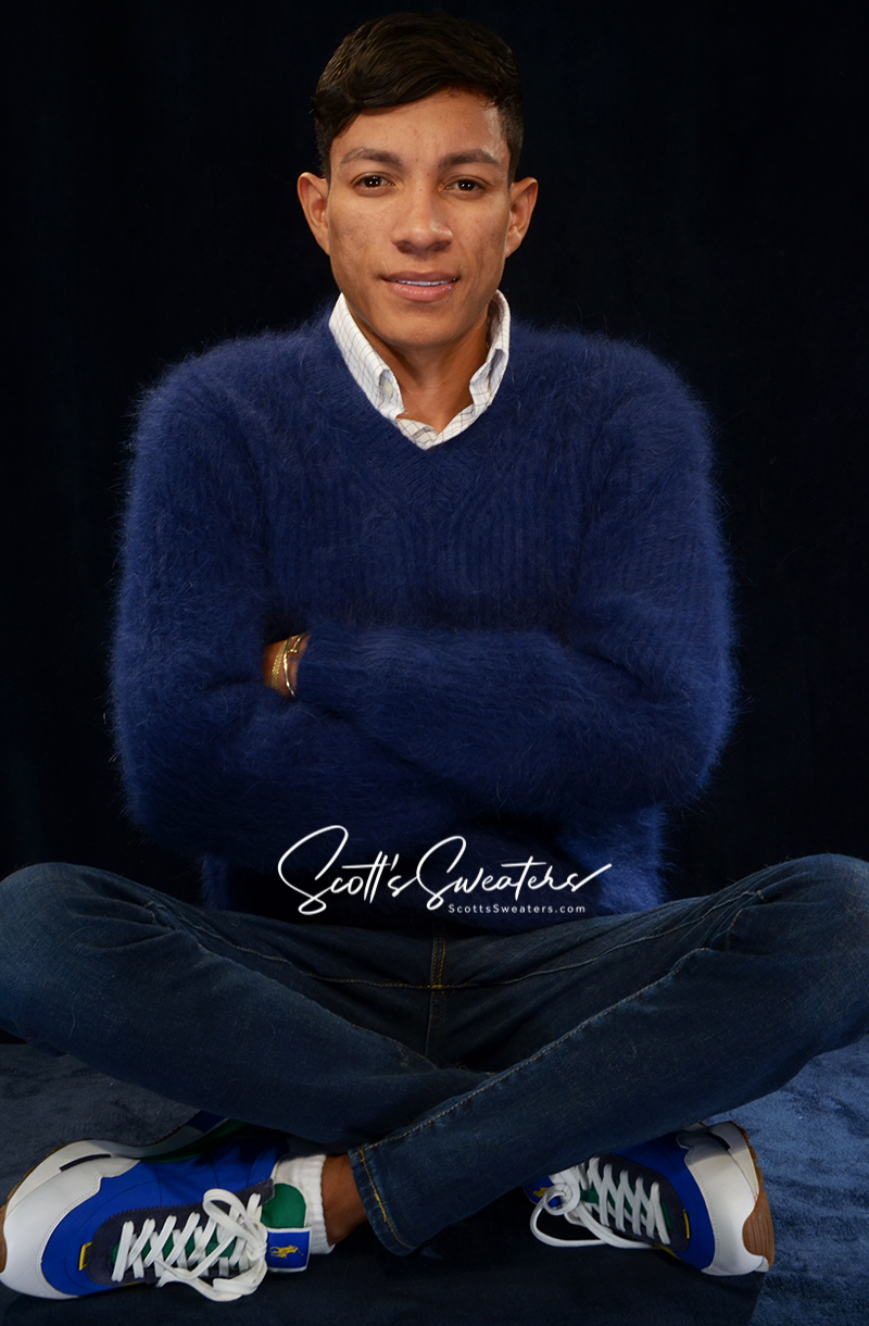 Men's soft luxurious angora sweater in blue with rib-knit design and V-neck worn casually