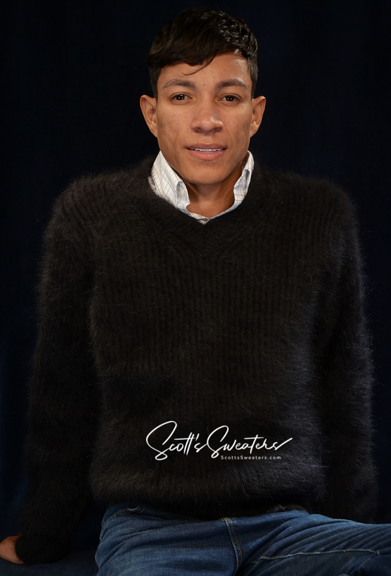 Men's soft luxurious black angora sweater with V-neck rib-knit design worn by male model