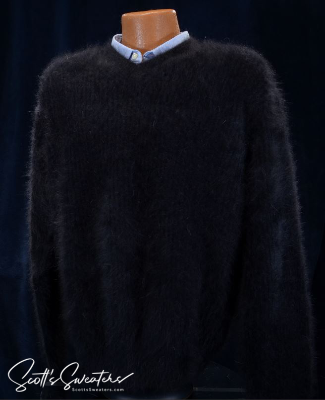 Men's soft luxurious black angora V-neck sweater on mannequin with blue shirt underneath