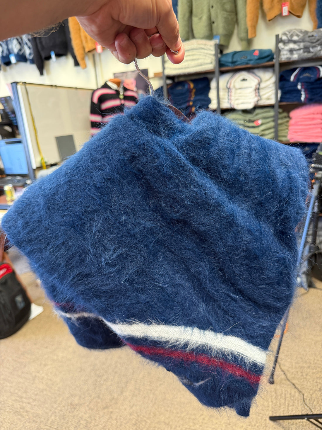 How store sweaters on hanger