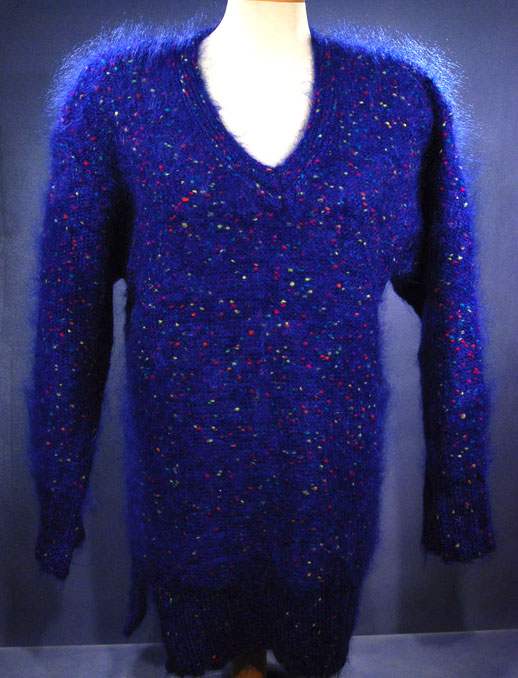 Woman's blue speckled mohair V-neck sweater with red, green, yellow, and blue knit-in specks, small-medium size