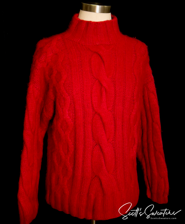 Red woman's cabled mock-turtleneck sweater made of angora, lambswool, and nylon blend
