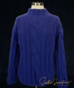 Woman's cabled mock-turtleneck sweater in soft angora and lambswool blend with nylon binder, deep blue color.