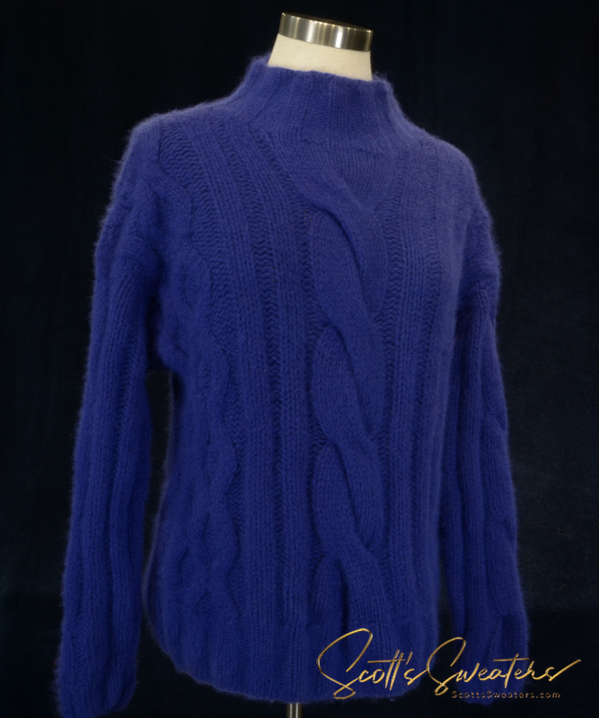 Purple woman's cabled mock-turtleneck sweater made from angora and lambswool blend