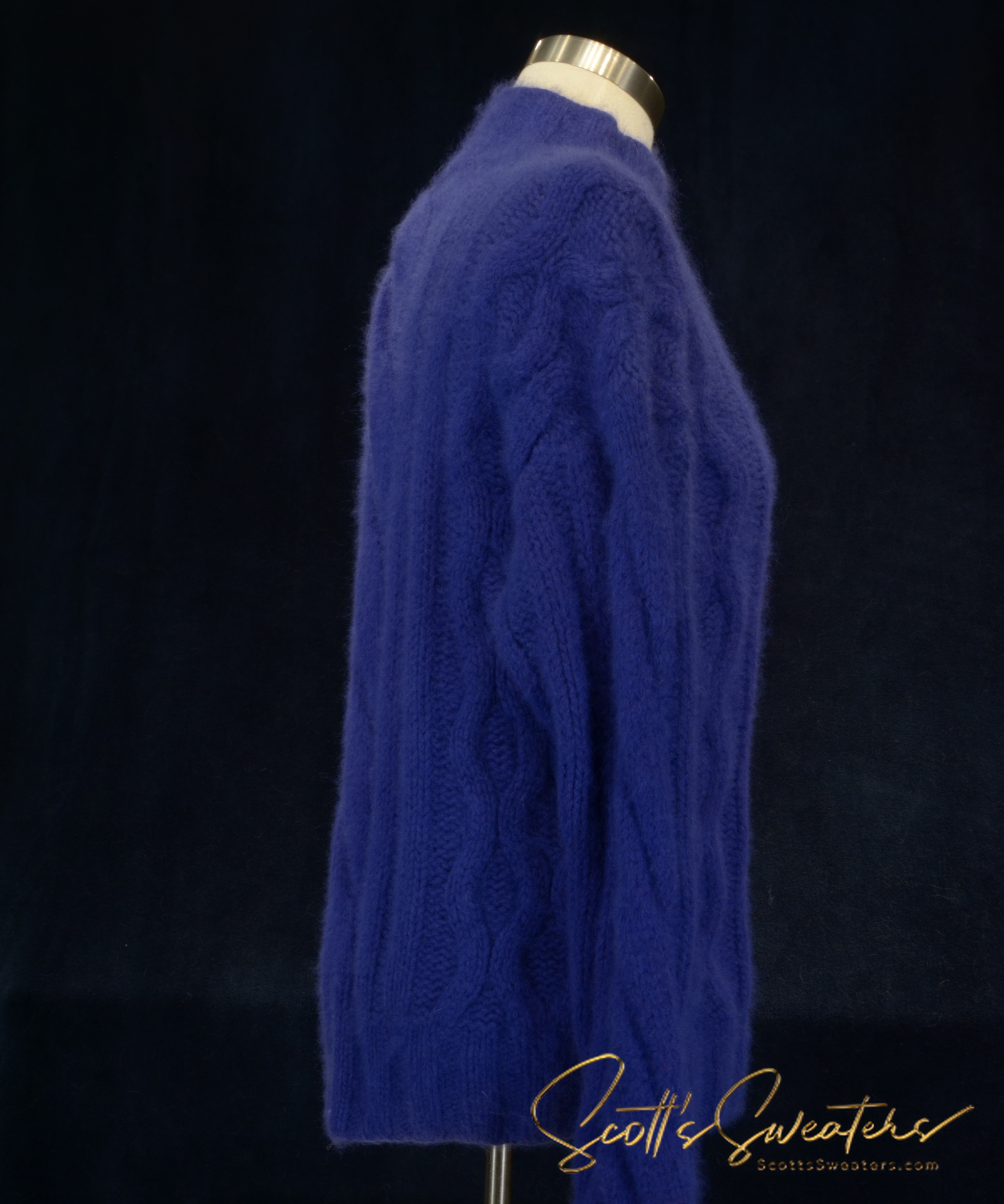 Soft blue woman's cabled mock-turtleneck sweater made of angora and lambswool blend