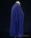 Soft blue woman's cabled mock-turtleneck sweater made of angora and lambswool blend