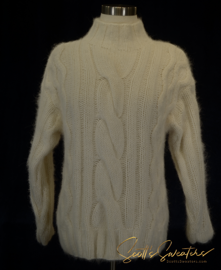 Woman's cabled mock-turtleneck sweater in soft angora and lambswool blend with intricate cable knit design