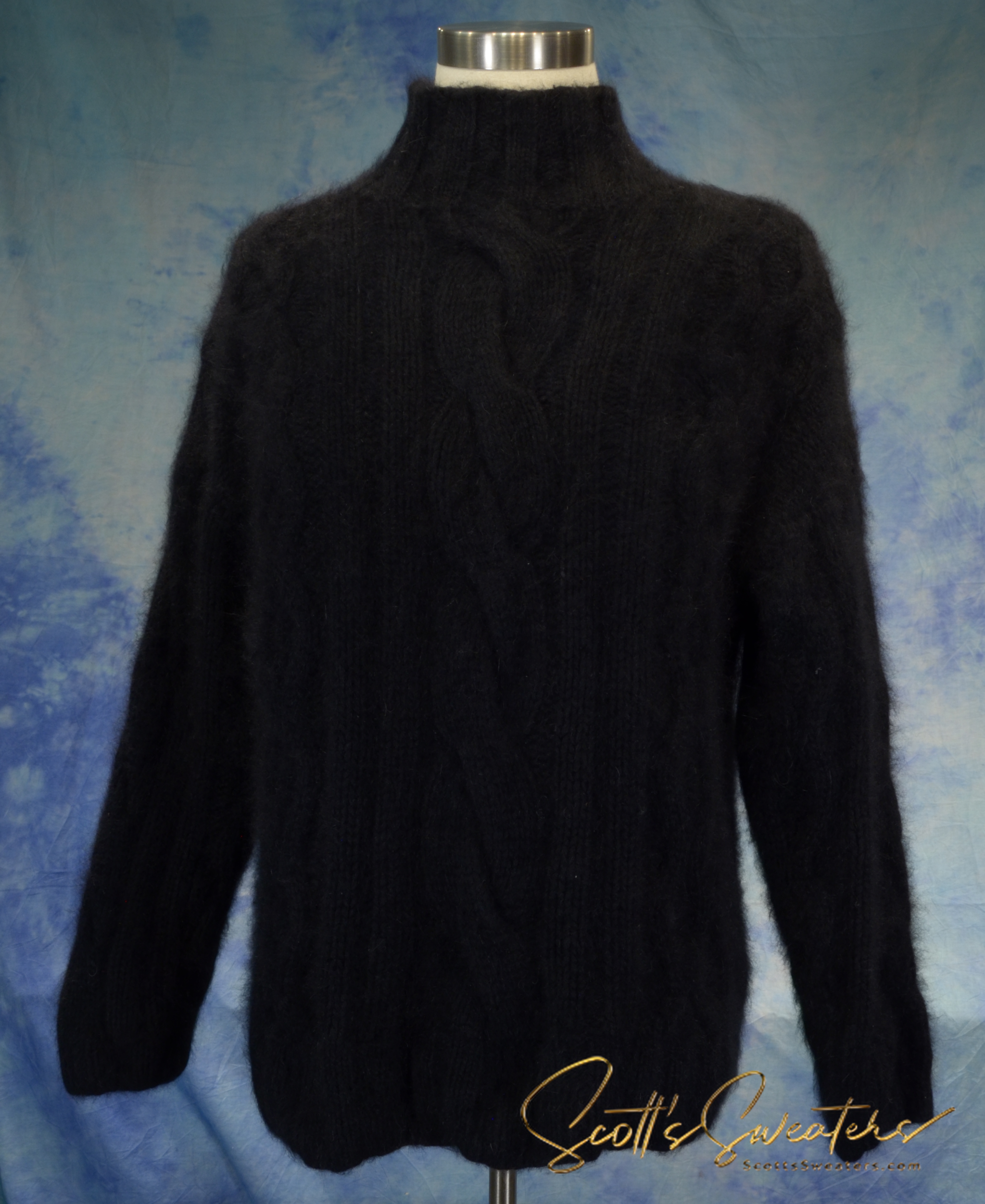 Black woman's cabled mock-turtleneck sweater made of angora and lambswool blend
