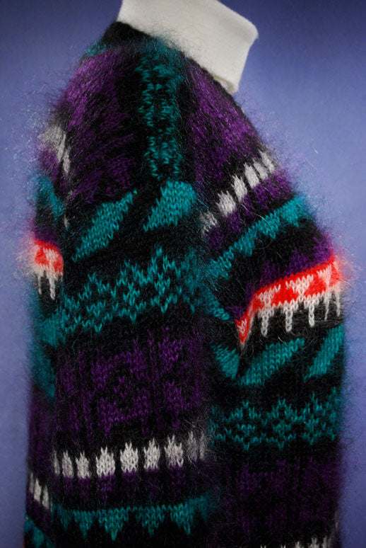 Woman's black multi-color striped mohair crewneck sweater side view
