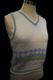 Girl's ivory angora sweater vest with pastel stripe trim and diamond pattern