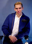 Men's retro zipper-front royal blue wool cardigan with black leather-trimmed pockets in X-Small size