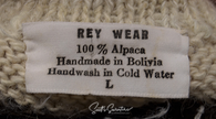 Unisex grey alpaca cardigan sweater with white trim and blue black yoke design by Rey Wear