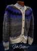 Unisex grey alpaca cardigan with white trim and blue black yoke by Rey Wear