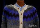 Unisex grey alpaca cardigan sweater with white trim and blue-black yoke design by Rey Wear