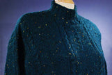 Woman's emerald-green 100% wool mock-turtleneck sweater with speckled knit design